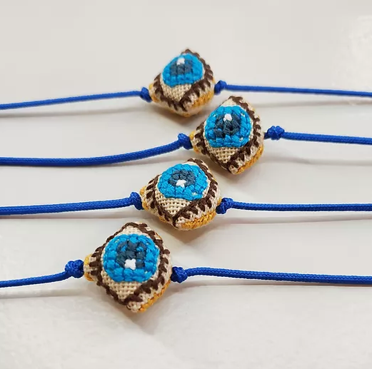 Mati with blue cord